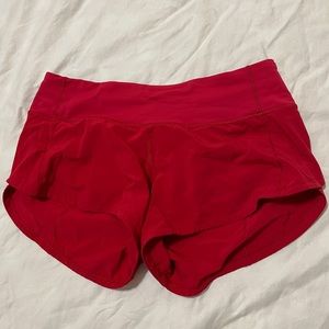 red lululemon speed up shorts size 2. 2.5 length